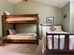 Upstairs bunk room - 2 twin beds, 1 full size bed. 